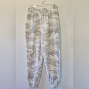Pink gray camouflage joggers.